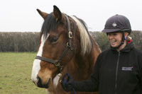 Paddy the horse with NTU equestrian centre technician, Charlotte Whyld