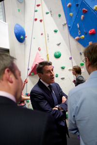 Lord Coe in front of the 30ft climbing wall